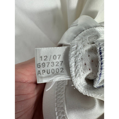 Étiquette d'authenticité avec code Adidas 697327 prouvant l'originalité du maillot