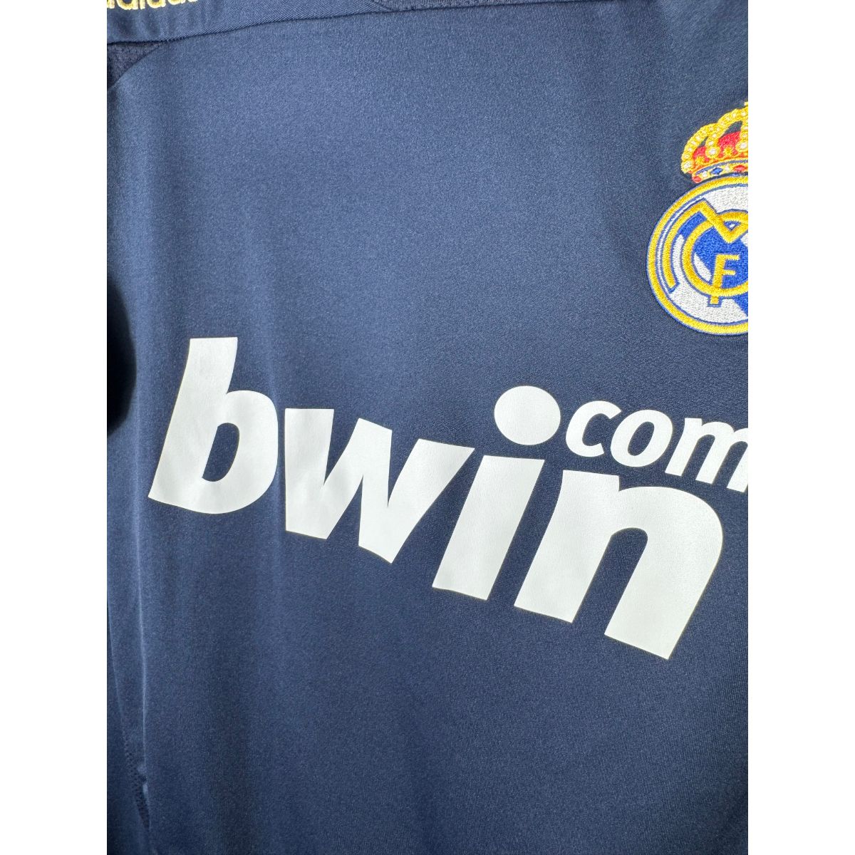 Détail de l'écusson du Real Madrid et du Bwin