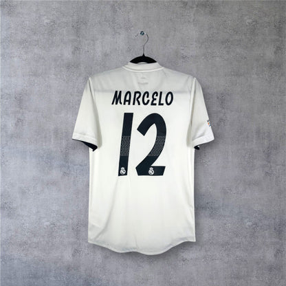 Flocage officiel noir MARCELO numéro 12 sur le maillot version joueur Real Madrid.