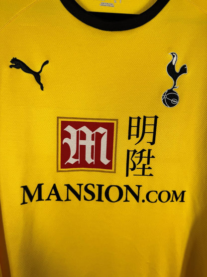 Détail du blason coq Tottenham brodé, logo Puma et sponsor Mansion.com sur le maillot gardien 2008-2009