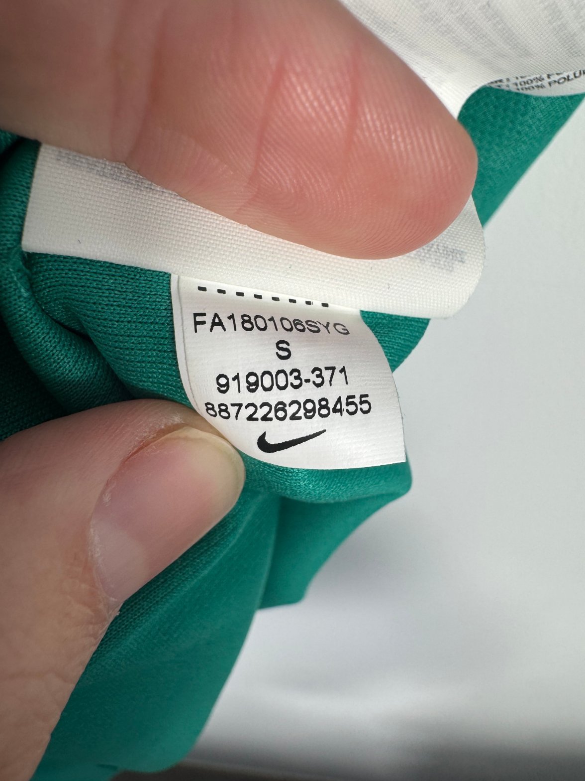 Étiquette d'authenticité avec code Nike 919003-371 prouvant l'originalité du maillot