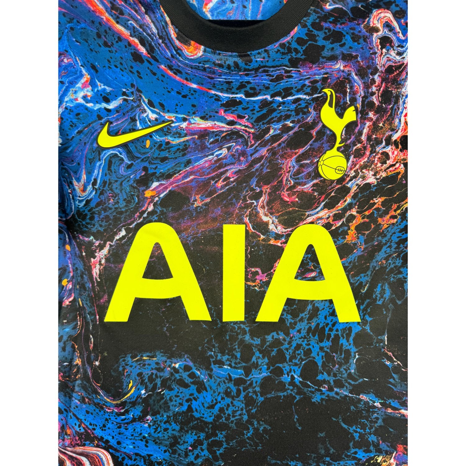 Détail de l'écusson de Tottenham et du logo Nike
