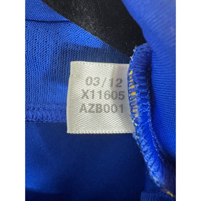 Étiquette d'authenticité avec code Adidas X11605 prouvant l'originalité du maillot
