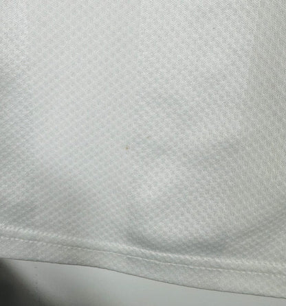 Petite marque discrète sur le tissu blanc du maillot Valencia CF 2019-2020