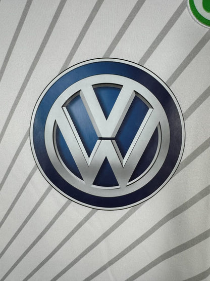 Détail du logo Volkswagen en relief et des rayures diagonales tissées du maillot extérieur 2014-2015