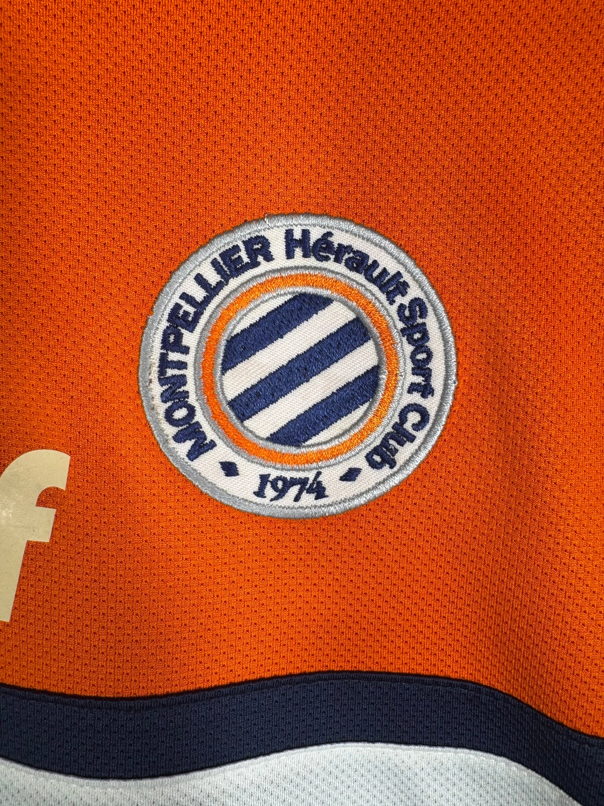 Détails du logo - Maillot Montpellier MHSC 2013-2014 Domicile Cabella N°10